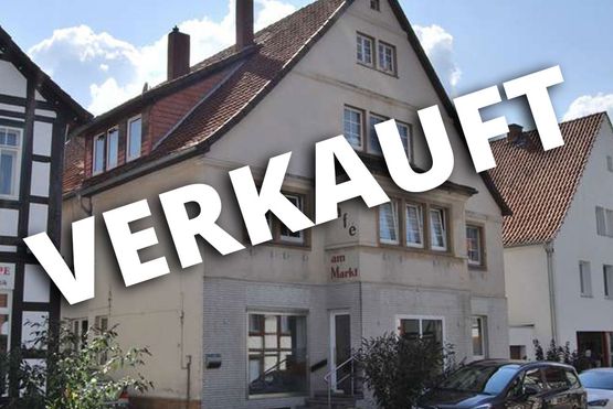 Zentrales Mehrfamilienhaus mit Gewerbeeinheit